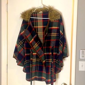 Winter Sherpa with wing sleeves, buttons and a tie.